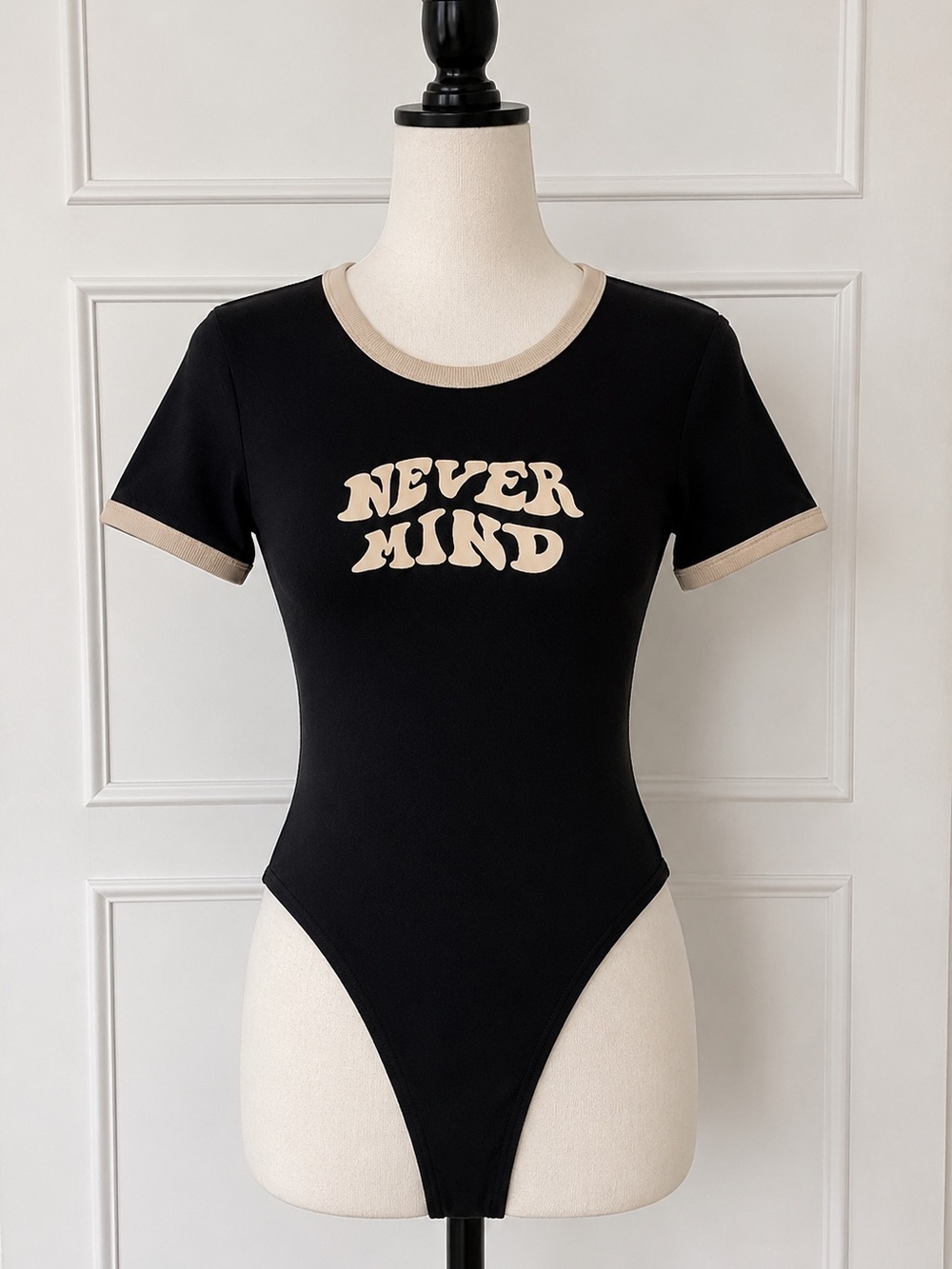SHEIN Black Bodysuit with Beige Trim & 'Never Mind' Graphic